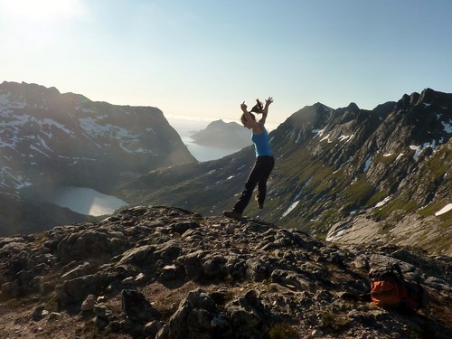 Me, doing some rather bad star jumps on Tverrfjellet. Skamtind in the far distance, Skarvatnet to the left of me