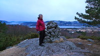 Astrid på Tveitavarden. Utsikt sørover mot Meland