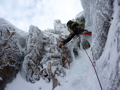 Grade IV crux moves straight above the belay on the final pitch of George.