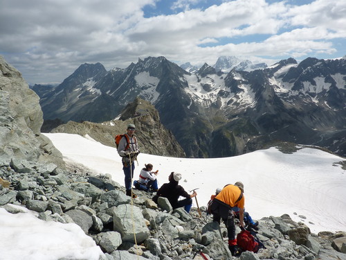 Taking off crampons before the short distance to the hut