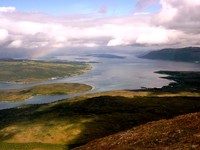 Rainbow over Balsfjorden/Straumsfjorden, Ryøya is the island on the left and Tromsøya behind the rainbow