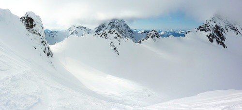 The steep descent on perfect powder, laid out in front of us