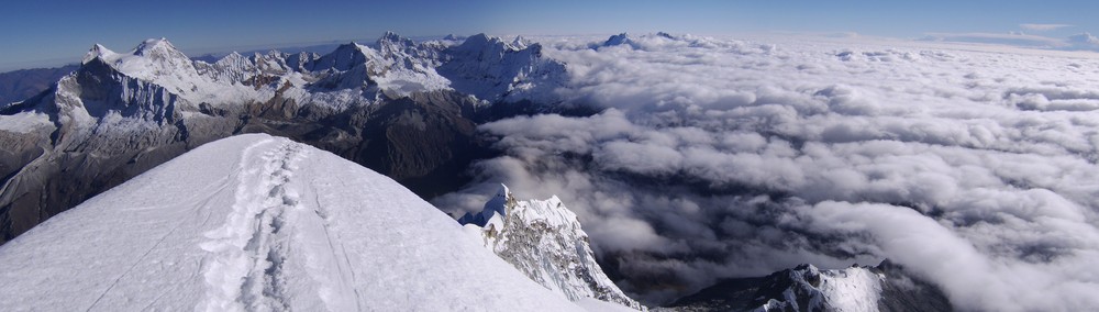 One of my earlier attempts at making a panoramic view from the summit of Chopicalqui. Huandoy is the mountain at the left edge of the photo