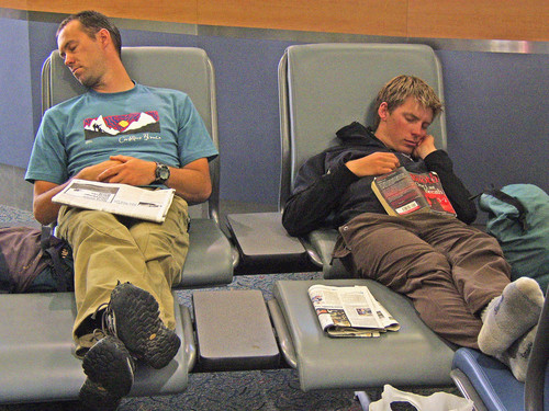 Two very exhausted climbers: Simon and Richard while we were in transit through a US airport (I can't remember which one though!)