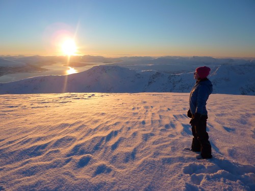 Kristin does her best to soak up the views from the summit