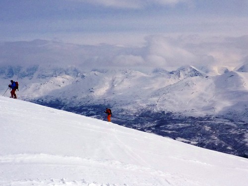 Passing some skier on my way down. Background of the Lyngen Alps.